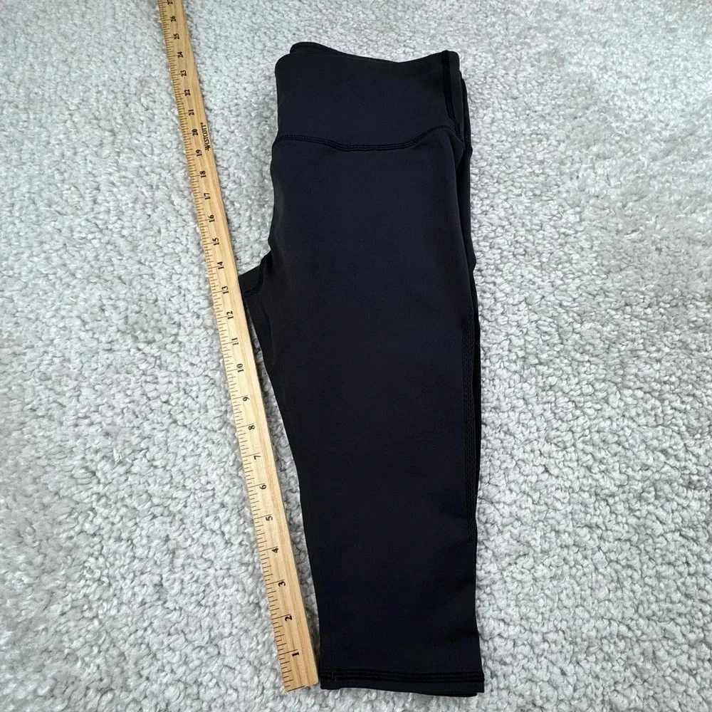 Lululemon Reveal Crop in Black. Mesh Sides. Size 12 or XL